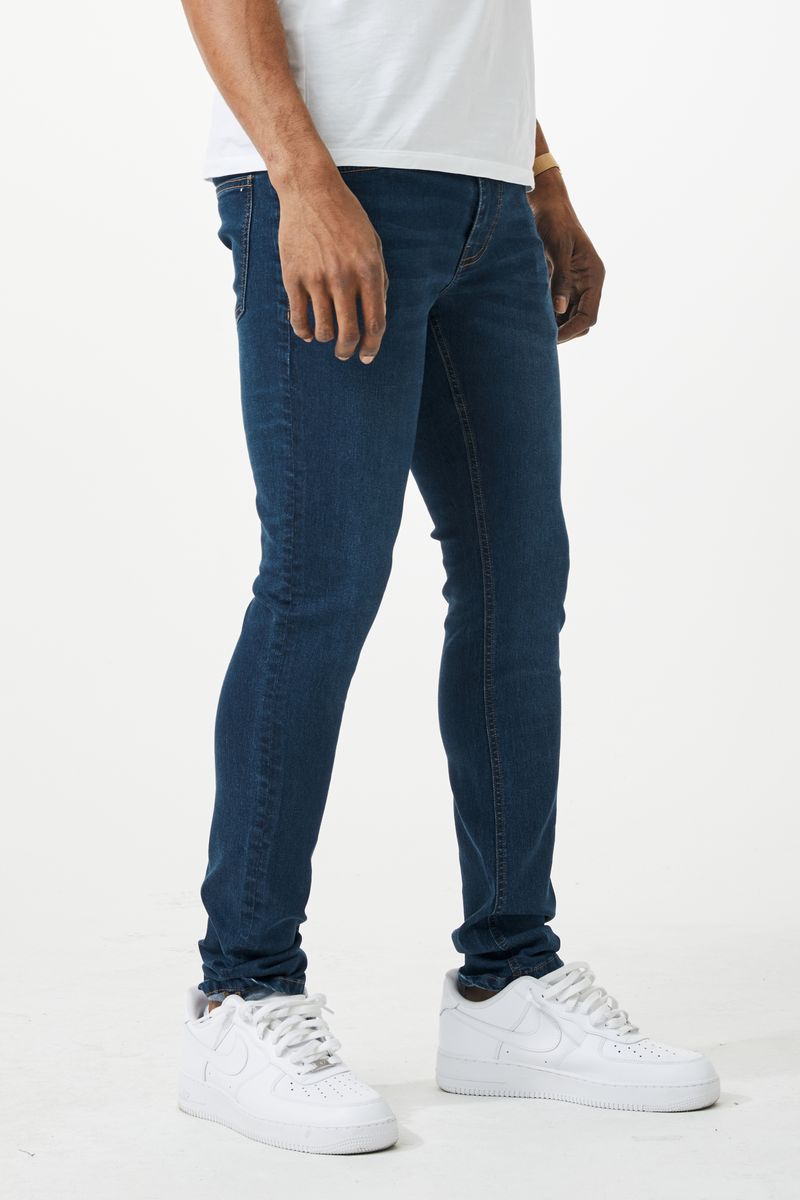VAQUEROS DE DENIM DE AJUSTE AJUSTADO