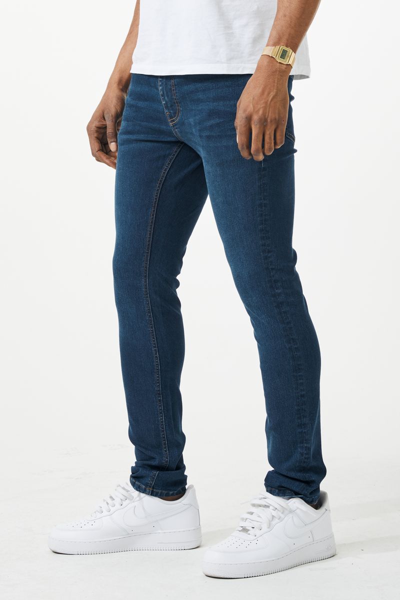 VAQUEROS DE DENIM DE AJUSTE AJUSTADO