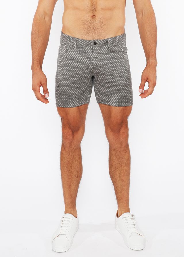 PANTALONES CORTOS CHINO DE PUNTO ELÁSTICO CON TEXTURA DE JAQUARD Y BOLSILLOS CON CREMALLERA