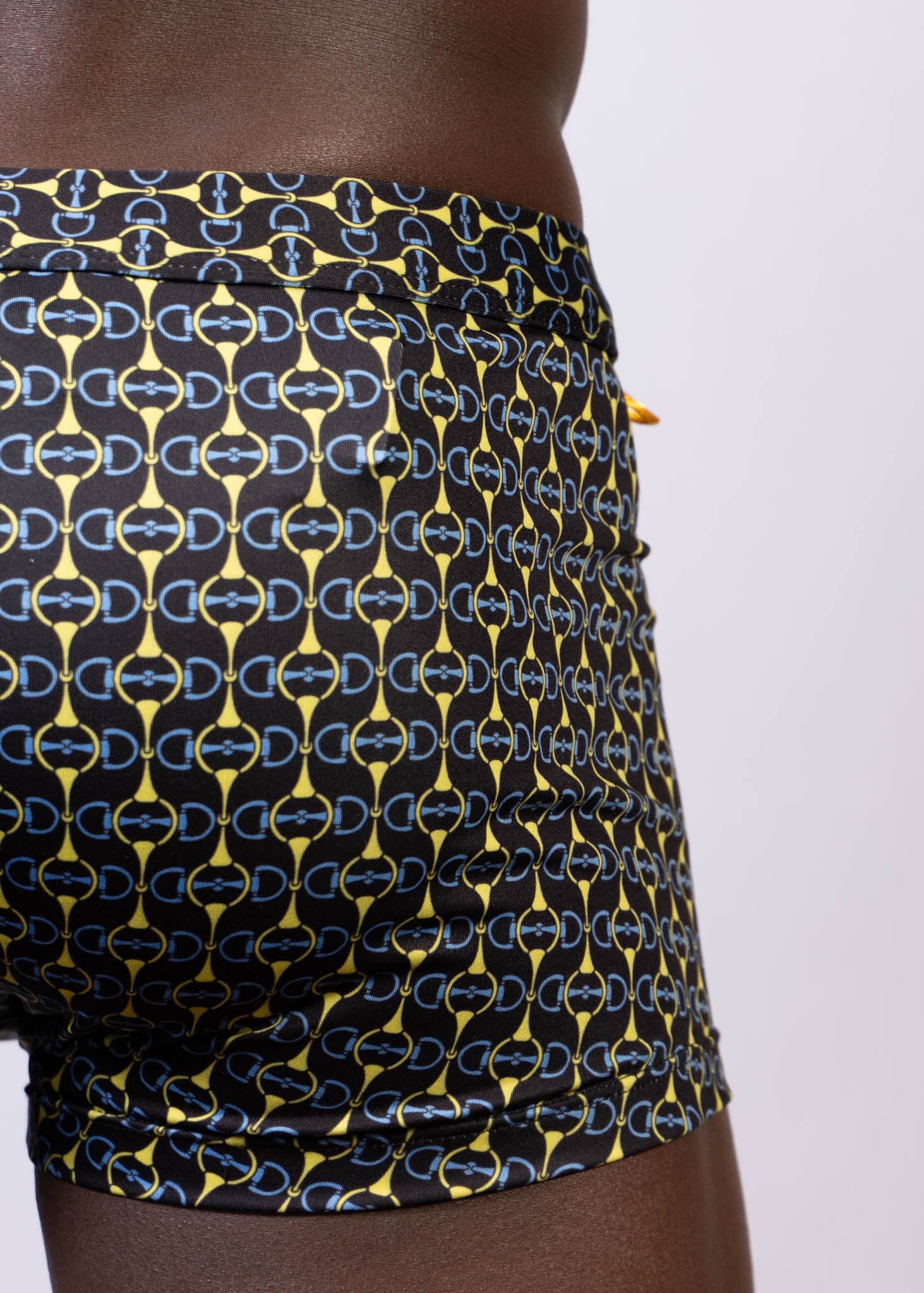 DESGNER BUCKLE PRINT SQ CUT TRUNK